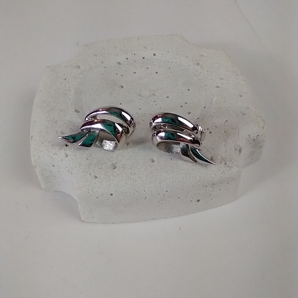 Silver Trifari clip earrings vintage swirl silver knot style